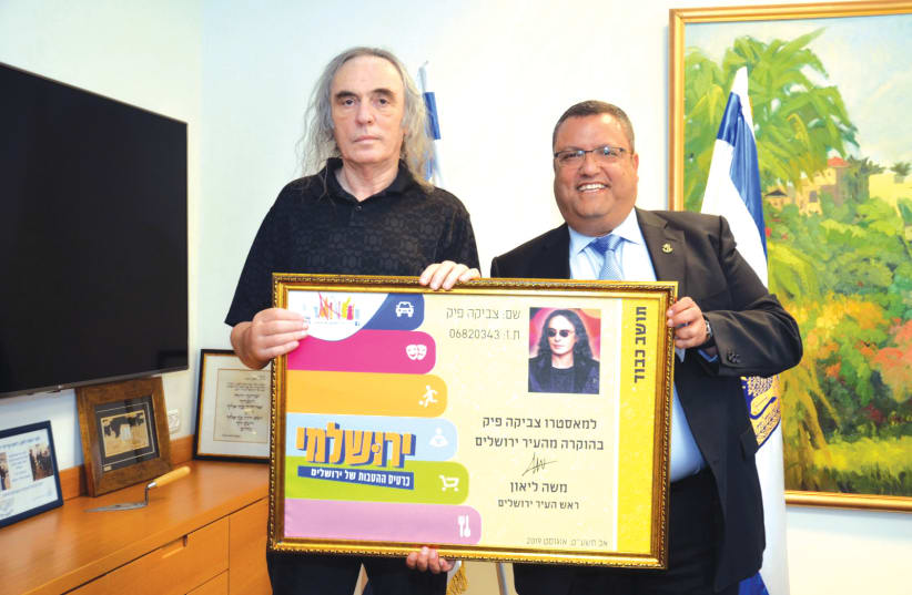 SVIKA PICK (left) receives honorary citizenship of Jerusalem from Mayor Moshe Lion (photo credit: JACK LEVY)