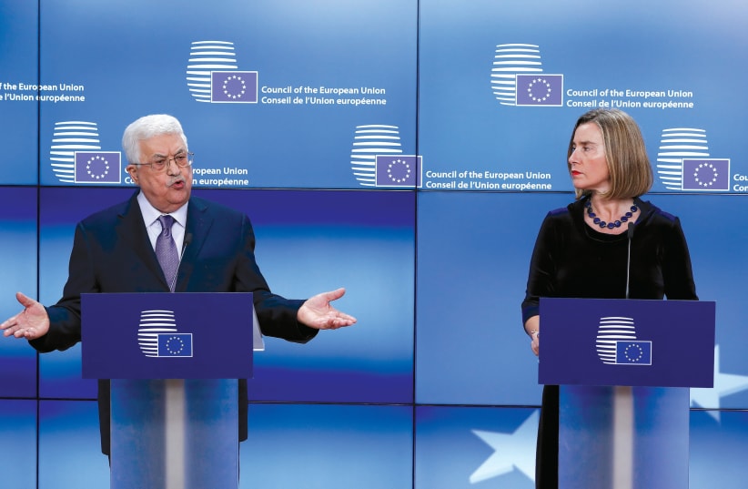 PALESTINIAN AUTHORITY President Mahmoud Abbas meets with European Union foreign policy chief Federica Mogherini (photo credit: REUTERS)