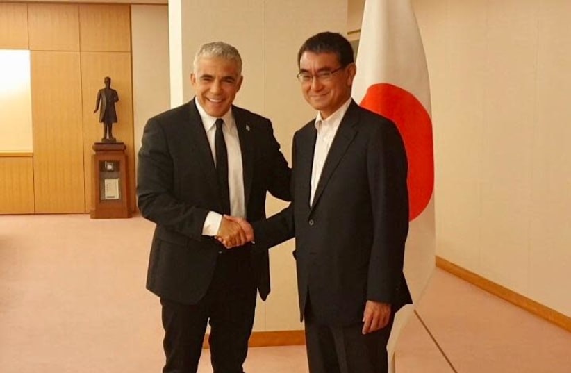 Yair Lapid with Japanese foreign minister Tarō Kōno, August 2019 (photo credit: YAIR ZIVAN)