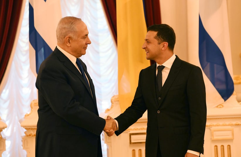 Prime Minister Benjamin Netanyahu meets with Ukrainian President Volodymyr Zelensky (photo credit: AMOS BEN GERSHOM, GPO)
