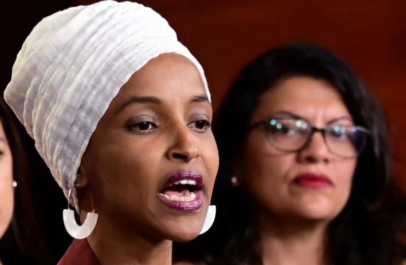 US Reps Ilhan Omar (D-MN) and Rashida Tlaib (D-MI) hold a news conference after Democrats in the US Congress moved to formally condemn President Donald Trump's attacks on four minority congresswomen on Capitol Hill in Washington (photo credit: ERIN SCOTT/REUTERS)