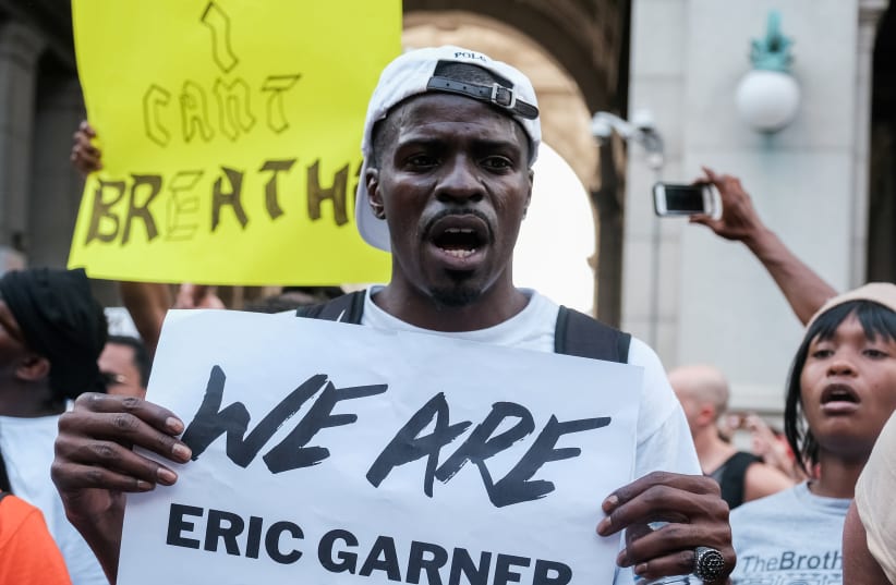 Protesters march and rally on the fifth anniversary of the death of Eric Garner in New York (photo credit: REUTERS)