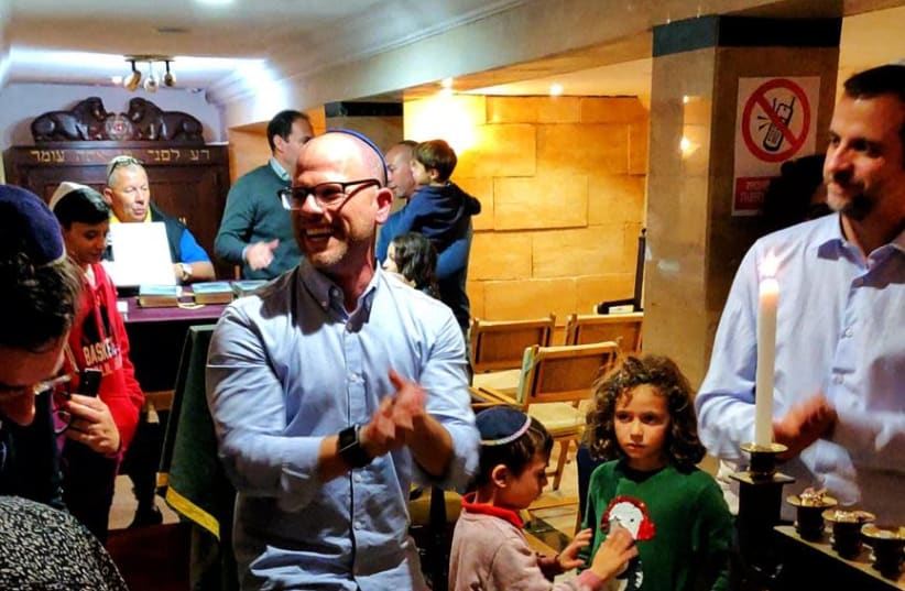 Dani Rotstein and the Majorca Jewish community celebrate Hanukah in December 2018. (photo credit: Courtesy)
