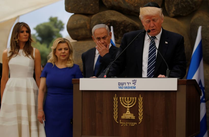 US President Donald Trump wears a kippah while delivering a speech at Yad Vashem in 2017 (photo credit: JONATHAN ERNST / REUTERS)