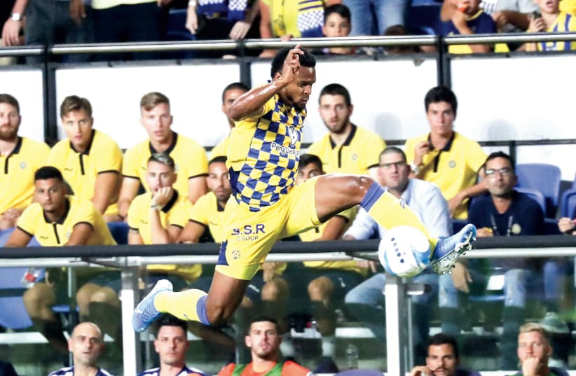 CHICO OFOEDU and Maccabi Tel Aviv are the reigning Israel Premier League champions, but a subpar continental campaign for the yellow-and-blue and improvement by other clubs have opened the door for an exciting season, which kicks off tomorrow (photo credit: DANNY MARON)