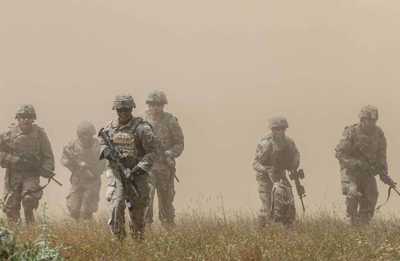 Cavalry scouts with 1st Armored Brigade Combat Team, 1st Infantry Division, maneuver toward cover after an air assault during Platinum Lion 19 at Novo Selo Training Area, July 9, 2019. Exercise Platinum Lion is a peace keeping operation/ counter insurgency event designed to provide quality, organize (photo credit: U.S. ARMY PHOTO/STAFF SGT. TRUE THAO)