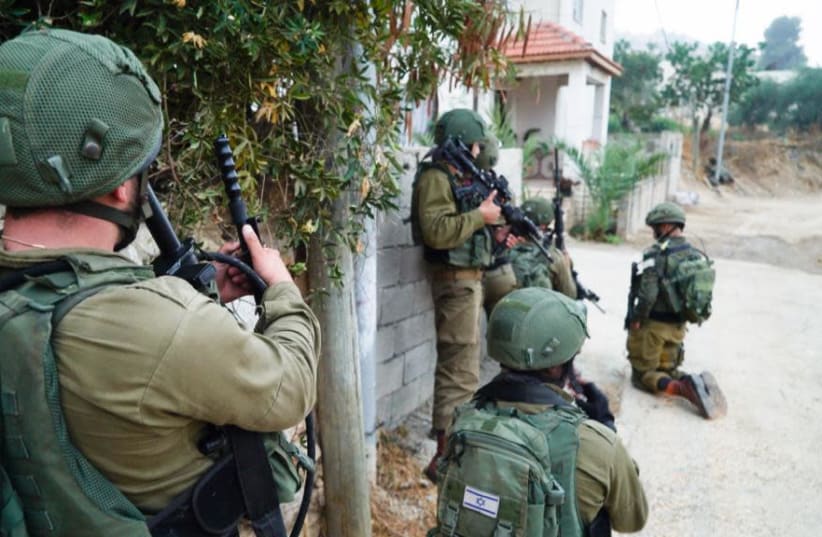 IDF searches for terrorist responsible for the death of a 17-year-old Israeli. (photo credit: IDF SPOKESPERSON'S UNIT)