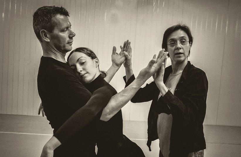 NADYA TIMOFEYEVA works with dancers in ‘Memento.’ (photo credit: LEONID HAROMCHENCKO)