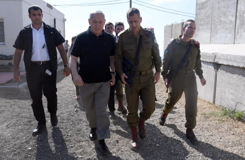Prime Minister and Defense Minister Benjamin Netanyahu meets with senior IDF officials in the North, August 25, 2019 (photo credit: HAIM ZACH/GPO)