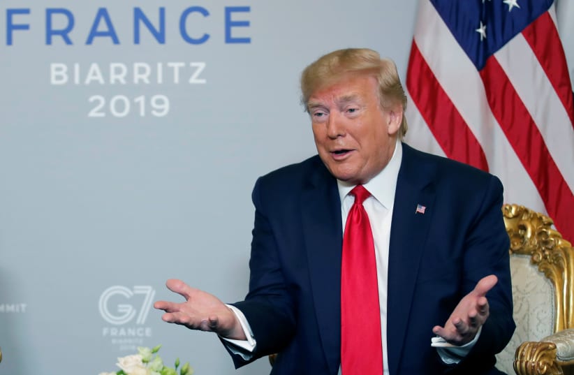 U.S. President Donald Trump speaks as he meets Egypt's President Abdel-Fattah el-Sisi (not pictured) for bilateral talks during the G7 summit in Biarritz, France, August 26, 2019 (photo credit: CARLOS BARRIA / REUTERS)