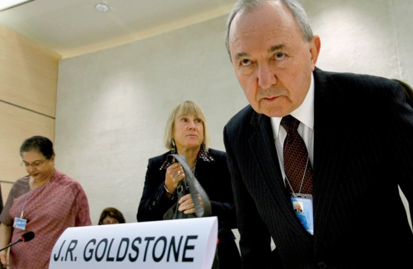 Richard Goldstone, head of the Fact-Finding Mission on the Gaza Conflict, takes his seat during a session of the UN’s Human Rights Council in Geneva in 2009 (photo credit: DENIS BALIBOUSE / REUTERS)