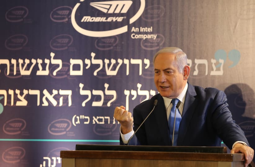 Prime Minister Benjamin Netanyahu attends a ceremony laying the cornerstone for the new Mobileye global development center in Jerusalem, August 27 2019 (photo credit: AMIT SHABI/POOL)