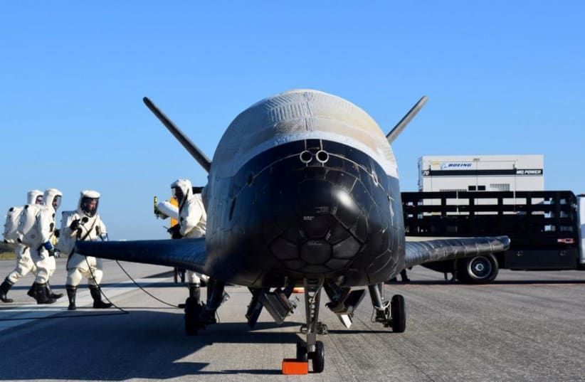 The U.S. Airforce's X-37B Orbital Test Vehicle mission 4 after landing at NASA's Kennedy Space Center Shuttle Landing Facility in Cape Canaveral, Florida, U.S., May 7, 2017.  (photo credit: REUTERS)
