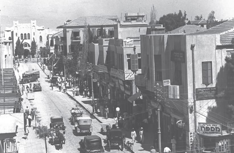 HERZL STREET in 1934, during Tel Aviv’s early years. The city is named after Herzl’s seminal work ‘Altenuland’; ‘Tel Aviv’ is the title of the Hebrew translation of ‘Altneuland.’ (photo credit: Wikimedia Commons)