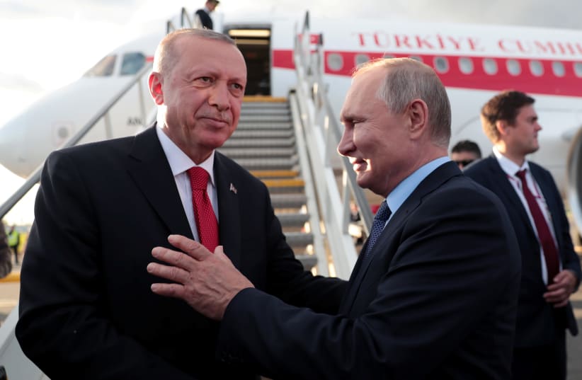 Turkish President Tayyip Erdogan chats with his Russian counterpart Vladimir Putin before his departure at Zhukovsky Airport near Moscow, Russia, August 27, 2019. (photo credit: MURAT CETINMUHURDAR/PRESIDENTIAL PRESS OFFICE/HANDOUT VIA REUTERS)