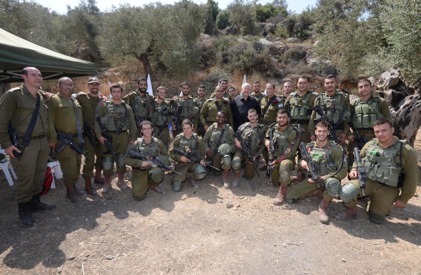 President Rivlin meets with soldiers in the IDF's Judea and Samaria Division. (photo credit: Mark Neiman/GPO)