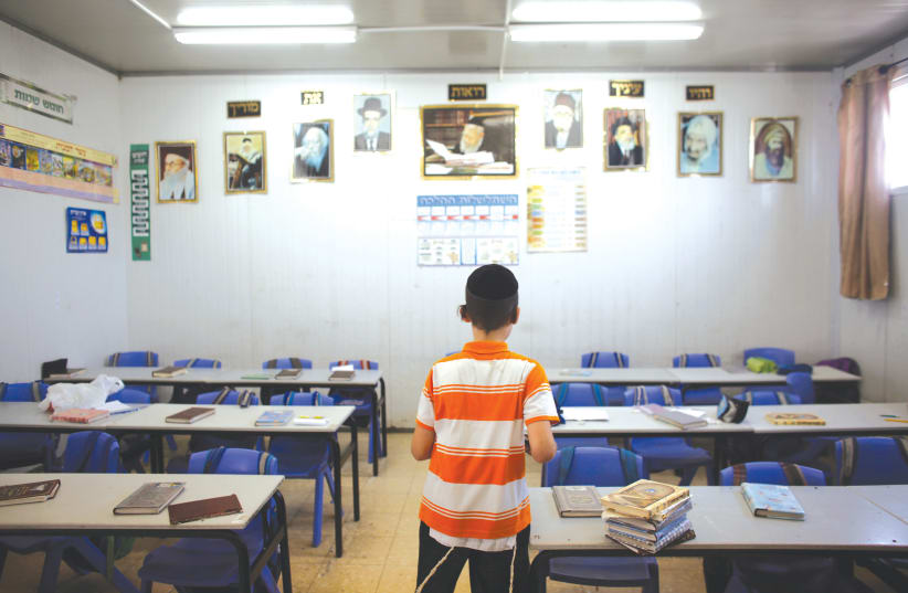A boy in Moaz Hatorah in Bnei-Brak (photo credit: NIR ELIAS / REUTERS)