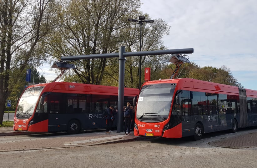 Electric buses on charge in the city of Edam, the Netherlands (photo credit: Courtesy)