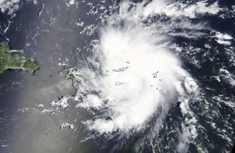 Handout photo of Hurricane Dorian is shown as it nears St. Thomas and the U.S. Virgin Islands (photo credit: NASA WORLDVIEW AND EOSDIS/HANDOUT VIA REUTERS)