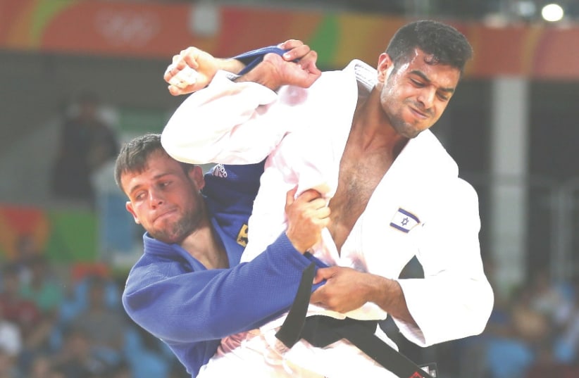 SAGI MUKI became the first Israeli male judoka to win a world championships gold medal this week in Tokyo (photo credit: REUTERS)
