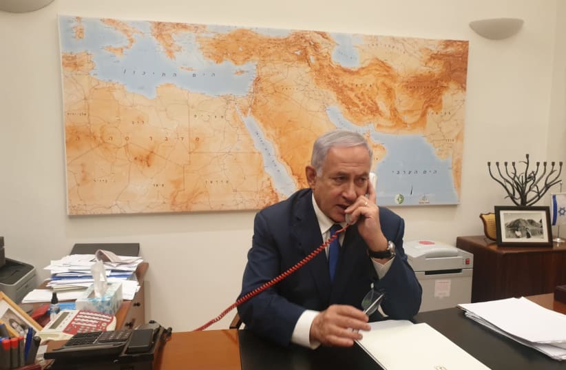 Prime Minister Benjamin Netanyahu in his office  (photo credit: PRIME MINISTER'S OFFICE)