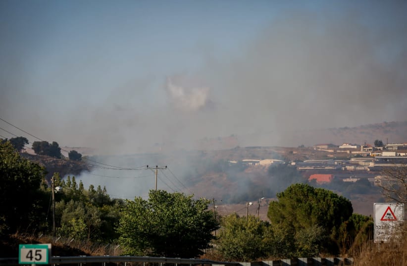 Smoke rises near Moshav Avivim near the border between Israel and Lebanon, in northern Israel, September 1, 2019. Photo by David Cohen/Flash90 (photo credit: DAVID COHEN/FLASH 90)