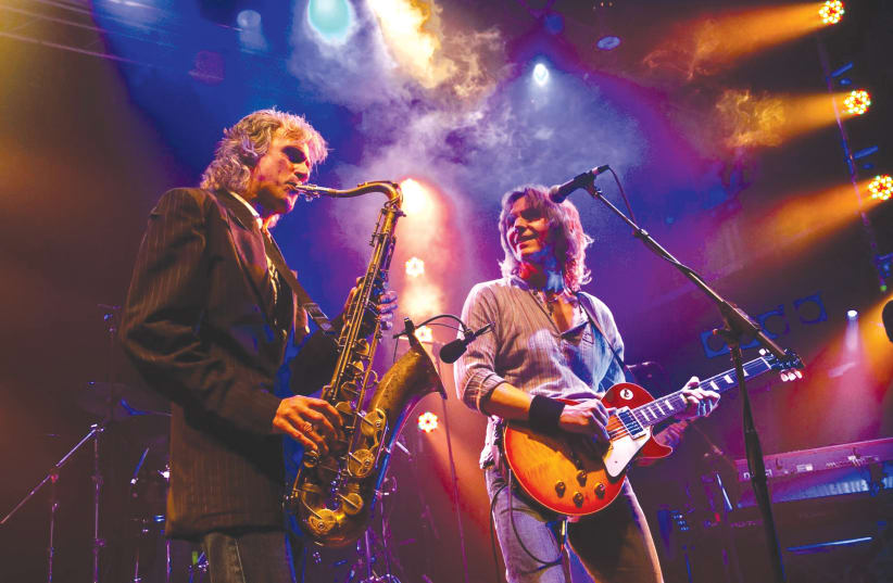Chris White (left) and Terence Feis of the Dire Straits Experience  (photo credit: Courtesy)