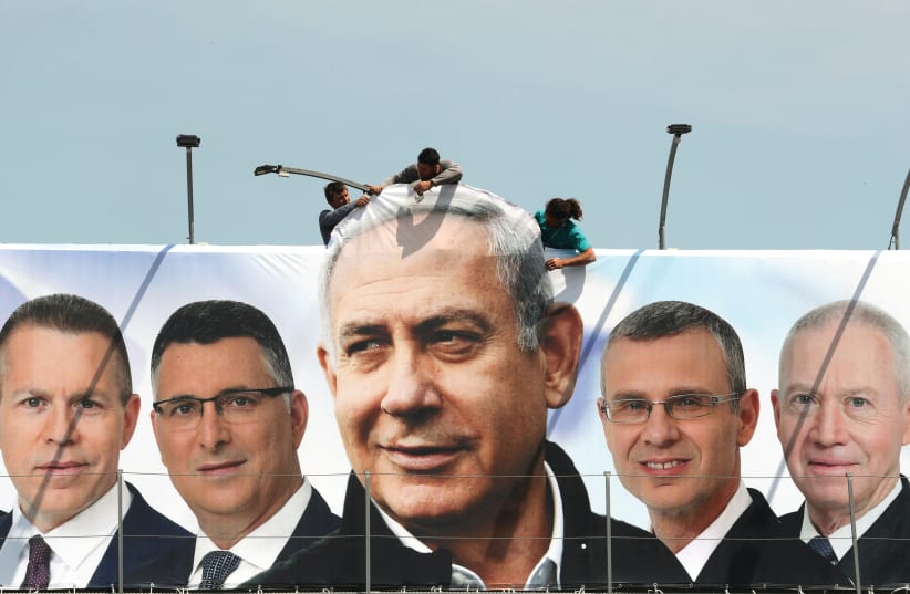 An election ad with Prime Minister Benjamin Netanyahu at the center   (photo credit: REUTERS)