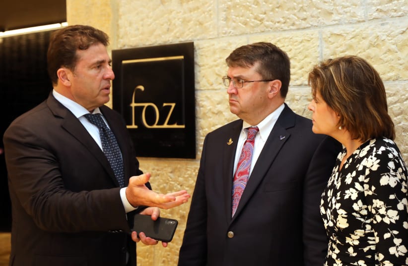 Dr. Rami Levi (Left) welcoming VA Secretary Wilkie (Center) and his wife, Julia (Left), to the FOZ Museum (photo credit: YOSSI ZAMIR)
