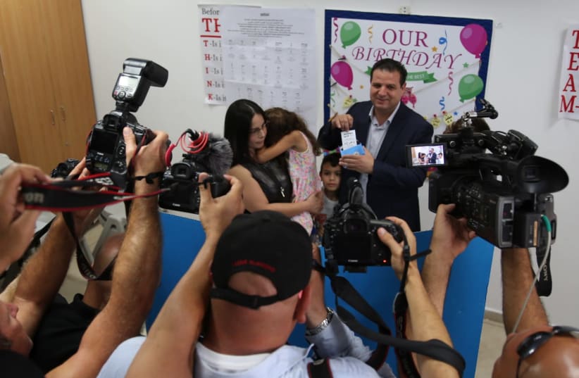 Joint List leader Ayman Odeh votes, September 17, 2019 (photo credit: JOINT LIST)