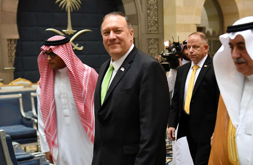 U.S. Secretary of State Mike Pompeo walks after stepping off his plane upon arrival at King Abdulaziz International Airport in Jeddah, Saudi Arabia, September 18, 2019 (photo credit: MANDEL NGAN/POOL/REUTERS)