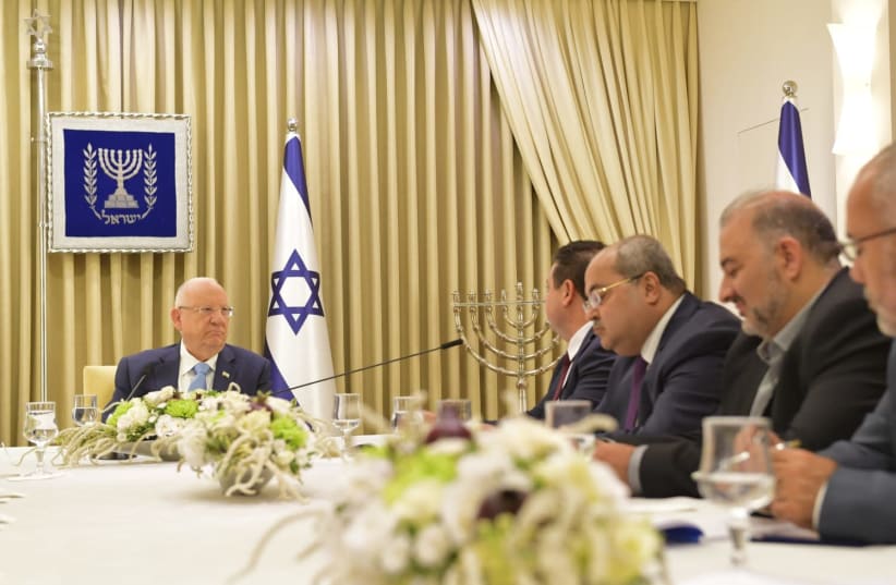President Reuven Rivlin with heads of the Joint Arab List (photo credit: KOBI GIDEON/GPO)