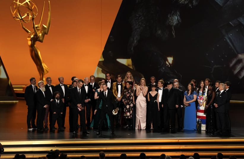 The cast of "Game of Thrones" accepts the Emmy for Outstanding Drama Series. (photo credit: REUTERS)