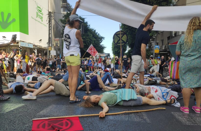 Thousands protest climate change in the streets of Tel Aviv. (photo credit: XR ISRAEL)