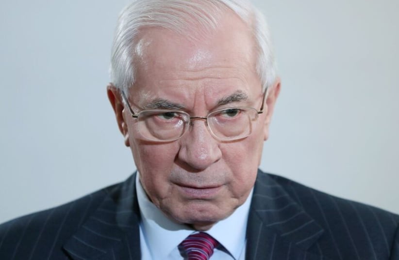 Former Ukrainian Prime Minister Mykola Azarov attends an interview with Reuters in Moscow, Russia September 26, 2019. Picture taken September 26, 2019 (photo credit: REUTERS/EVGENIA NOVOZHENINA)