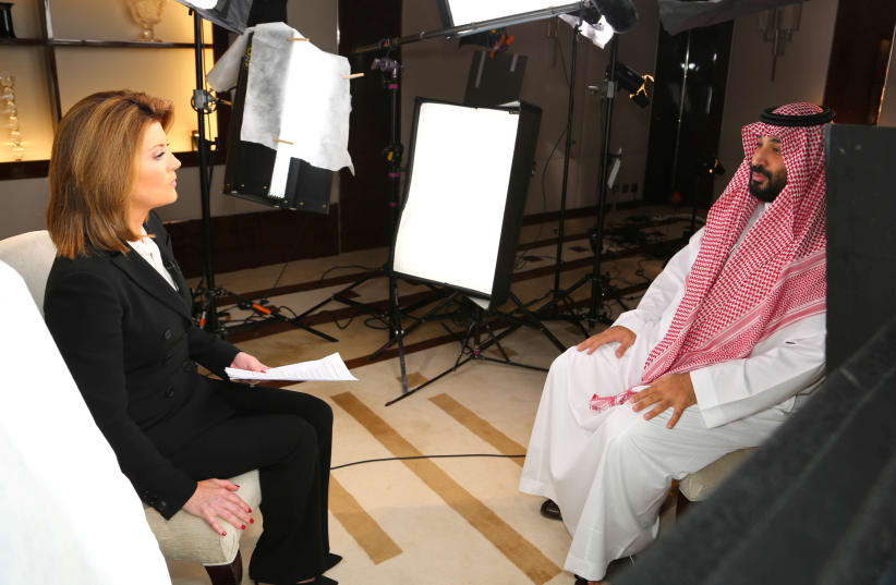 Saudi Arabia's Crown Prince Mohammed bin Salman speaks with correspondent Norah O'Donnell during an interview on Tuesday with the CBS program "60 Minutes," in Saudi Arabia, in this handout photo released on September 29, 2019 (photo credit: ERIC KERCHNER FOR CBSNEWS/60MINUTES/HANDOUT VIA REUTERS)