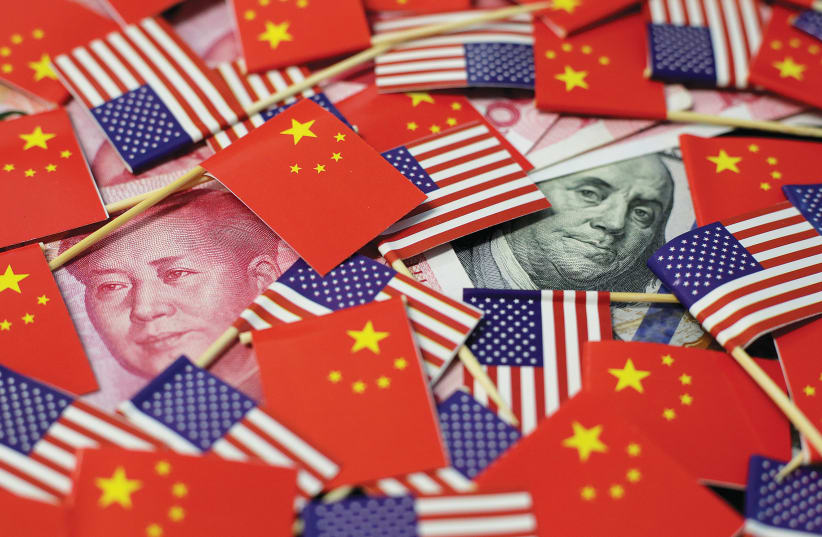 China and United States flags (photo credit: REUTERS)