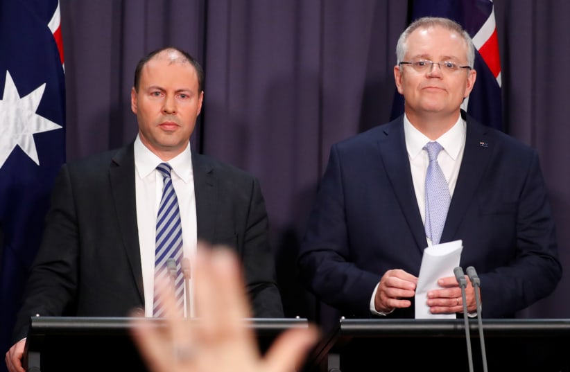 The new Australian Prime Minister Scott Morrison and his deputy Josh Frydenberg hold a news conference in Canberra, Australia August 24, 2018.  (photo credit: REUTERS/DAVID GRAY/FILE PHOTO)