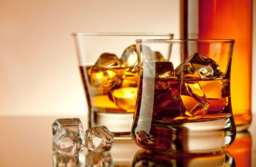Glass with whiskey and ice (Illustrative) (photo credit: Courtesy)