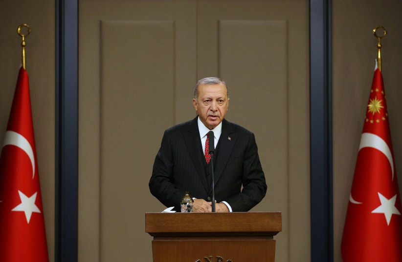 Turkish President Tayyip Erdogan speaks at Esenboga Airport in Ankara, Turkey, October 7, 2019 (photo credit: REUTERS)