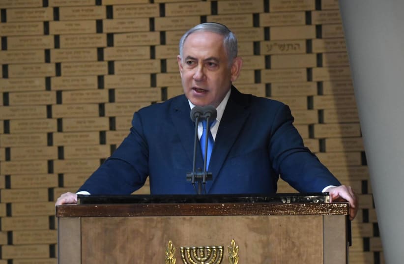 Prime Minister Benjamin Netanyahu speaks at the Memorial Service for the Victims of the Yom Kippur War at the Herzl Memorial Hall in Jerusalem, October 10 2019 (photo credit: GPO/AMOS BEN GERSHOM)