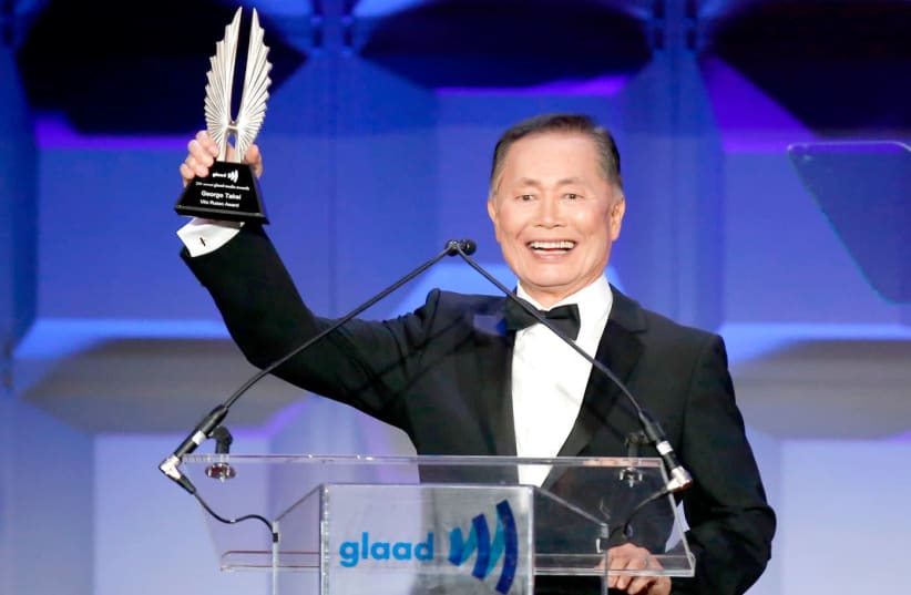 AFRICAN NATIONAL YACTOR GEORGE TAKEI accepts the Vito Russo Award during the 25th Annual GLAAD Media Awards in New York, May 2014. (photo credit: EDUARDO MUNOZ / REUTERS)