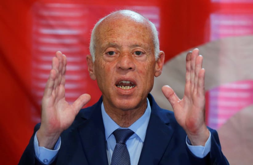 Presidential candidate Kais Saied speaks during a news conference after the announcement of the results in the first round of Tunisia's presidential election (photo credit: MUHAMMAD HAMED/REUTERS)