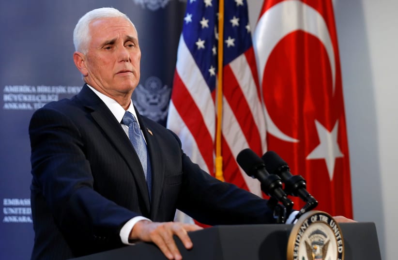 U.S. Vice President Mike Pence speaks to reporters at a news conference at the U.S. Embassy in Ankara, Turkey, October 17, 2019. (photo credit: HUSEYIN ALDEMIR/REUTERS)