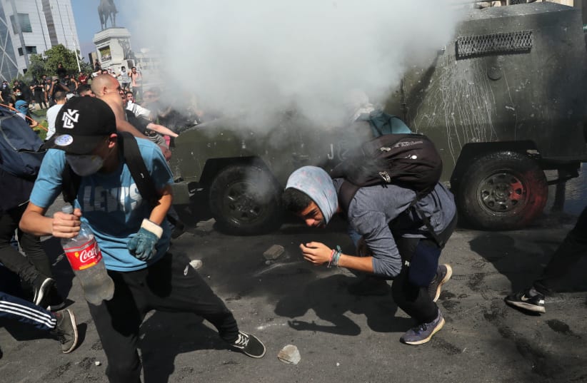 https://www.jpost.com/Breaking-News/Arrests-in-Chile-during-demonstrations-for-46th-anniversary-of-coup-601043 (photo credit: REUTERS/IVAN ALVARADO)