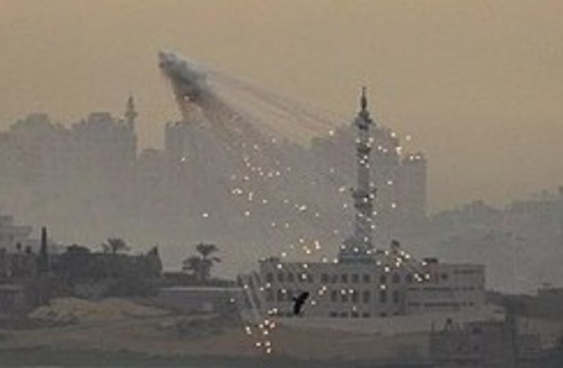 artillery fire in gaza 248.88 (photo credit: AP)