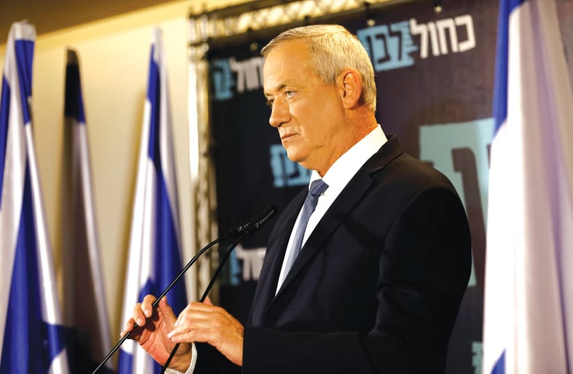 BENNY GANTZ : His government would only have to last until Netanyahu is indicted (photo credit: REUTERS)
