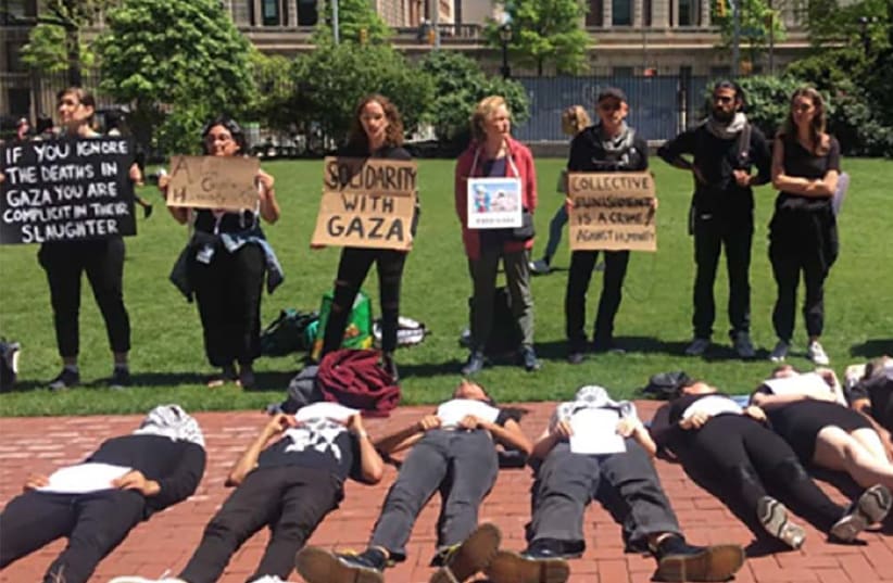 Students at Columbia University hold a "die-in" demonstration (photo credit: ACF)