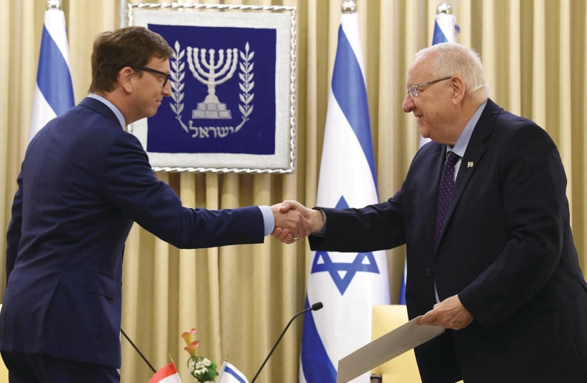 Hungarian Ambassador Levente Benko and Israeli President Reuven Rivlin (photo credit: Courtesy)