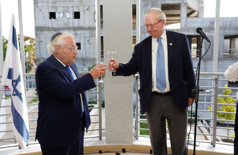 US Ambassador David Friedman toasting the opening of the new medical school at Ariel University.  (photo credit: TPS/HILLEL MEIR)
